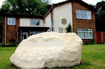 Mount Lourdes Sign & House